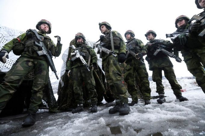 NATO, in Arctic training drills, faces up to Putin's 'unpredictable' Russia.