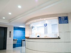 Dana-Farber Retracts 7 Papers Amid Misconduct Probe A researcher at a Dana-Farber Cancer Institute laboratory examines a sample under a microscope.