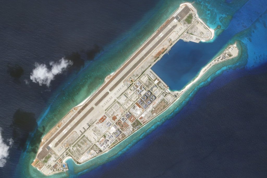 China bolsters South China Sea fortifications and Philippines military