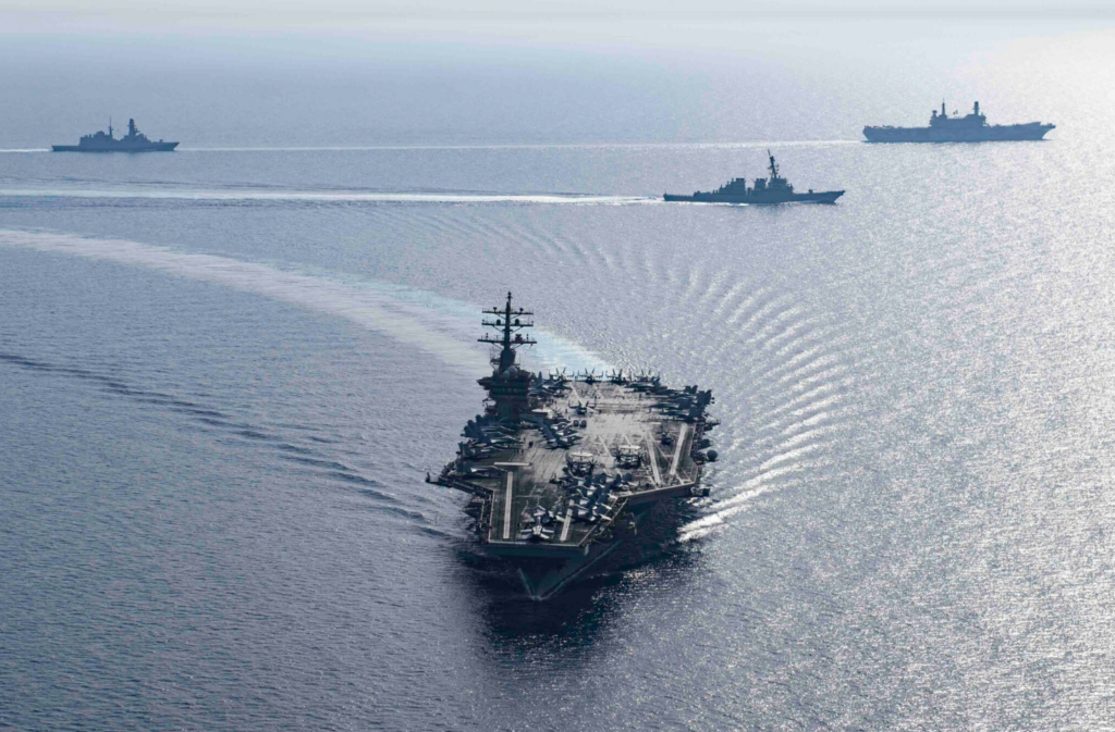 Military aircraft and cruise missiles launch over the Red Sea during US and UK strikes on Houthi targets in Yemen.